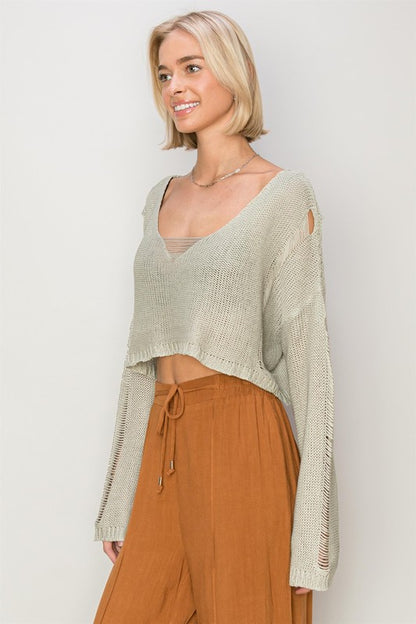 Standing Out Distressed Sweater Crop Top